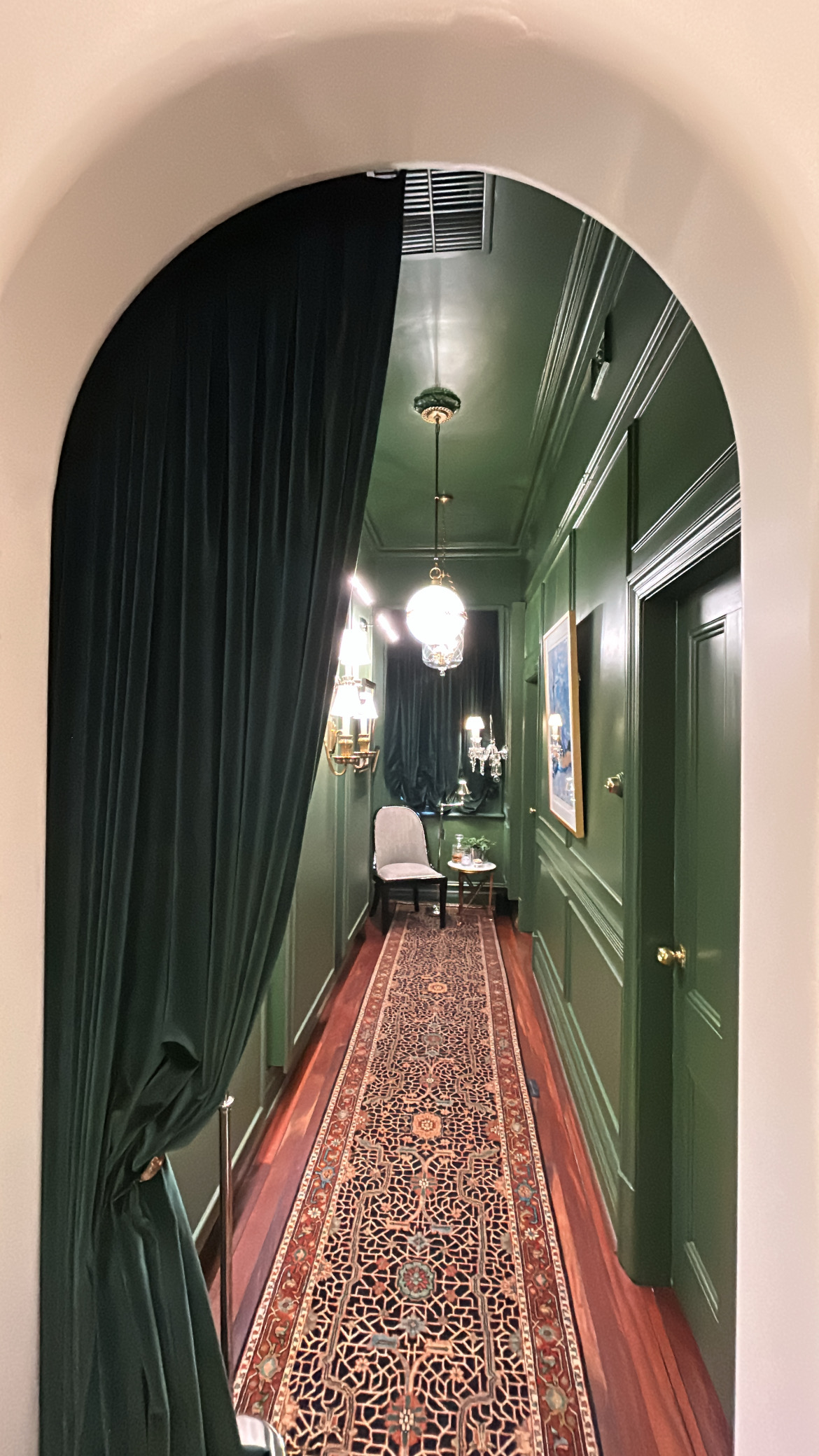 Showroom featuring Ralph Lauren lighting and furniture. 