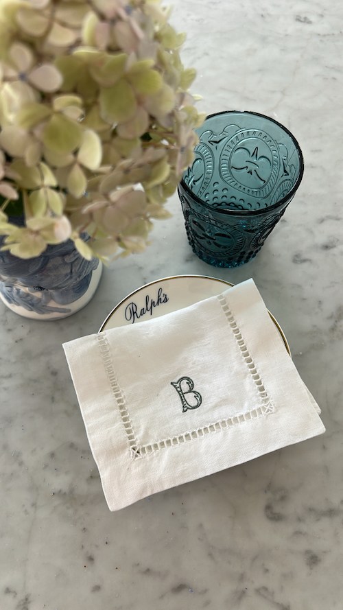 Monogram cocktail napkin in a classic kitchen setting