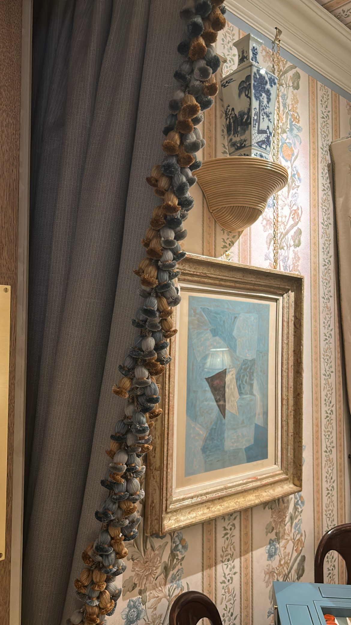 Trims edging the curtains in this timeless sitting room at Wow!House London